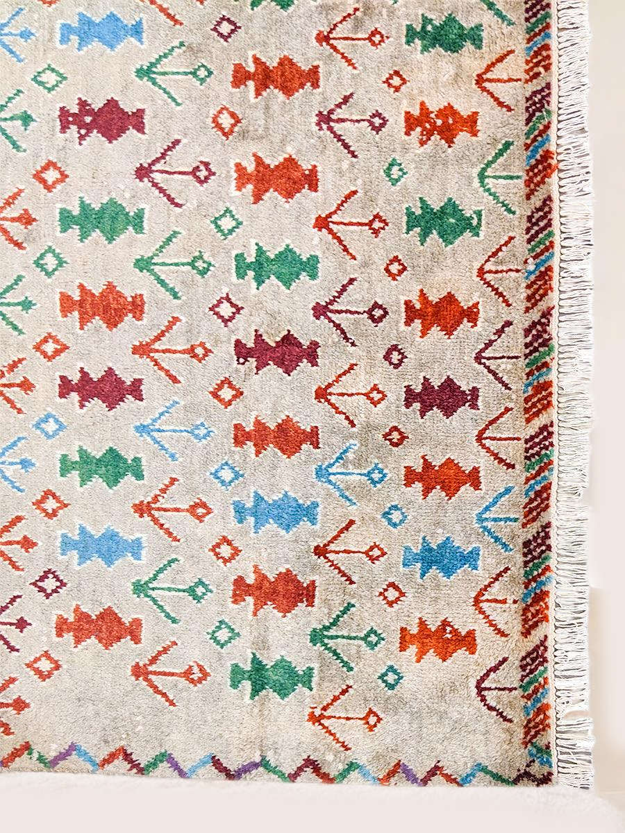 Full view of the 278 x 199 cm tangerine hand-knotted wool rug