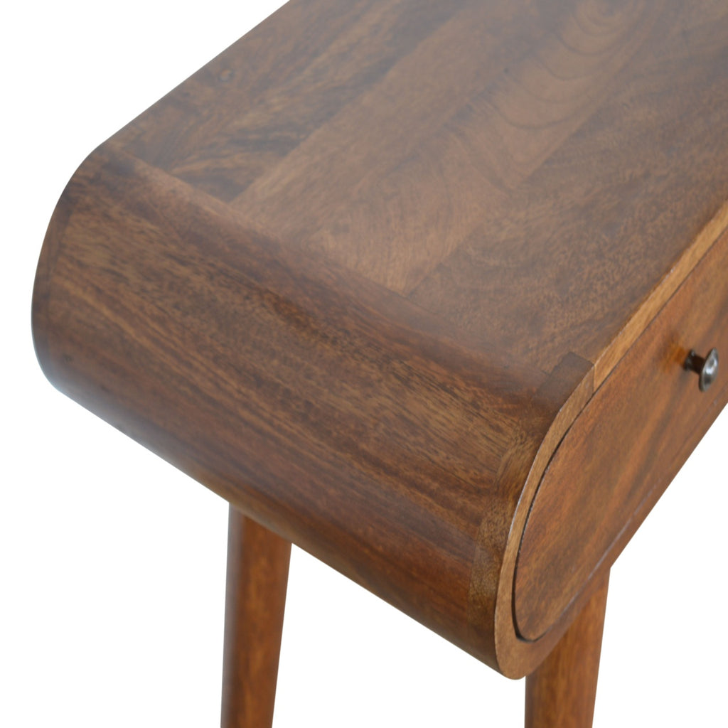 Natural mango wood grain on the chestnut console table